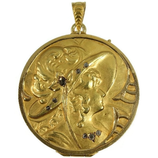 Late Victorian gold locket pendant with rose cut diamonds